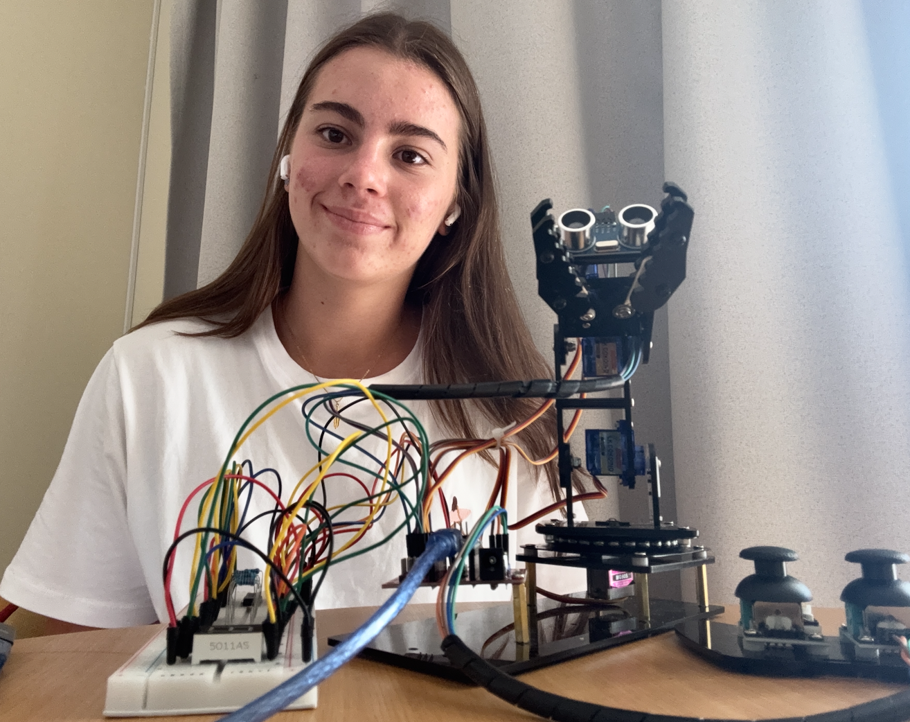Smart Assistive Three-Jointed Robotic Arm